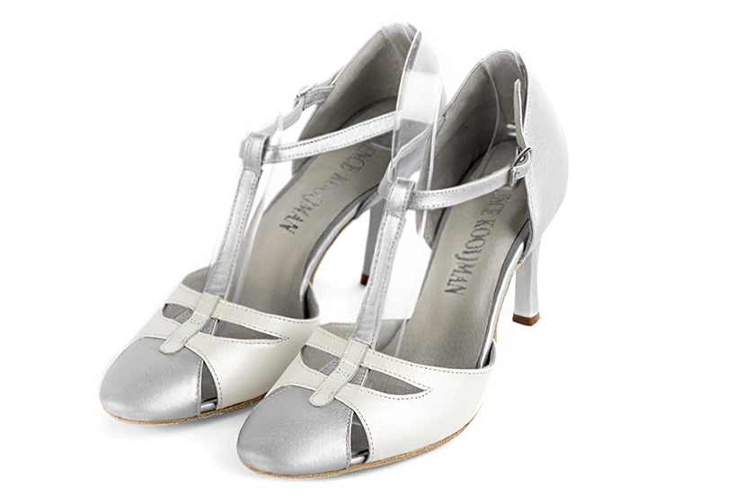French elegance and refinement for these light silver and pure white dress T-strap open side shoes, 
                available in many subtle leather and colour combinations. A pretty model with a comfortable "Salomé" strap and good support.
Its charming spyglass cut-out gives you plenty of scope for personalisation.  
                Matching clutches for parties, ceremonies and weddings.   
                You can customize these shoes to perfectly match your tastes or needs, and have a unique model.  
                Choice of leathers, colours, knots and heels. 
                Wide range of materials and shades carefully chosen.  
                Rich collection of flat, low, mid and high heels.  
                Small and large shoe sizes - Florence KOOIJMAN